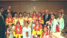 AT RIGHT, BACK ROW, P.M. YITZHAK RABIN AND ISRAELI AMBASSADOR TO SOUTH KOREA ASHER NAIM POSE WITH A SOUTH KOREAN FOLKLORE TROUPE. (1994)