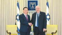 Former Party secretary Peng Qinghua meeting with Reuven Rivili