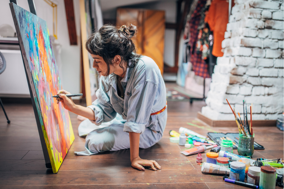 Young female painter at work