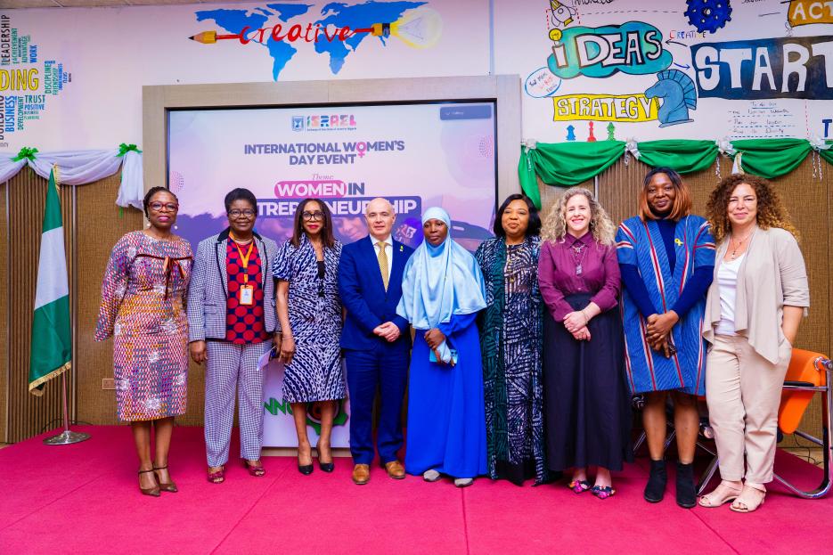 Speakers at the Women's day event with the Ambassador