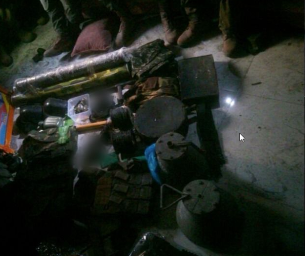 Weapons found in Terrorist's House (photo credit: IDF) Weapons found in Gaza
