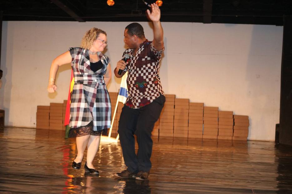 Ambassador Cooper dancing with Dr. Sylvanus Kwashie Kuwor