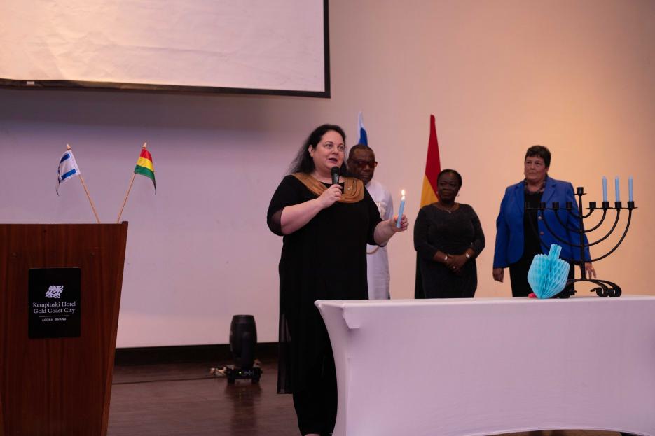 H. E. Shlomit Sufa Lighting Hanukkah Candle with US Ambassador to Ghana (photo credit: MFA Accra) H. E. Shlomit Sufa Lighting Hanukkah Candle with US Ambassador to Ghana