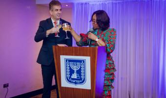 H.E. Cohen in a Toast with colleague Minister, Hon. Shirley Ayorkor Botchewy 