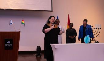 H. E. Shlomit Sufa Lighting Hanukkah Candle with US Ambassador to Ghana