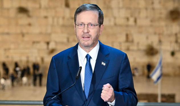 President Herzog broadcasting fron the Western Wall