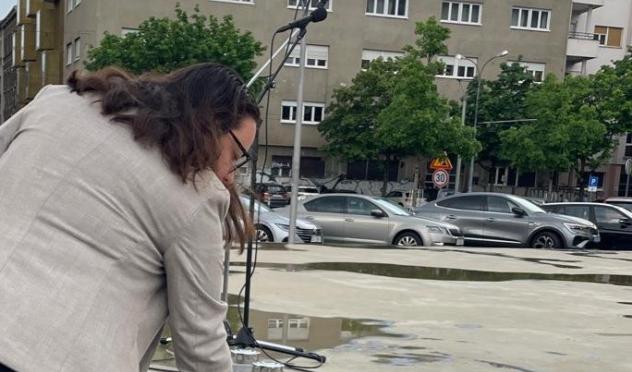 hadas dolev leaving pebble at holocaust memorial