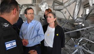 President Herzog visits site of Iranian missile attack